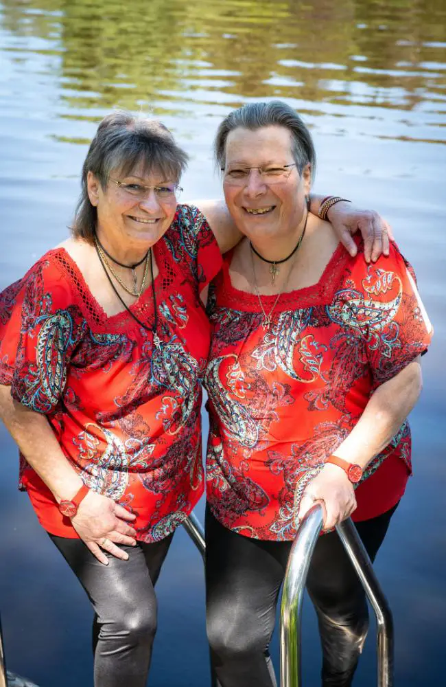 two women standing next to each other and practicing first date etiquette for people over 50