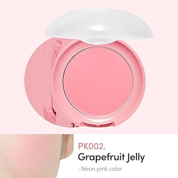 Light pink blusher in a round pink and white compact.