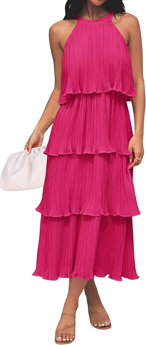 Pink multi-tiered flowy max length summer dress to demonstrate what to wear a wedding over 50.