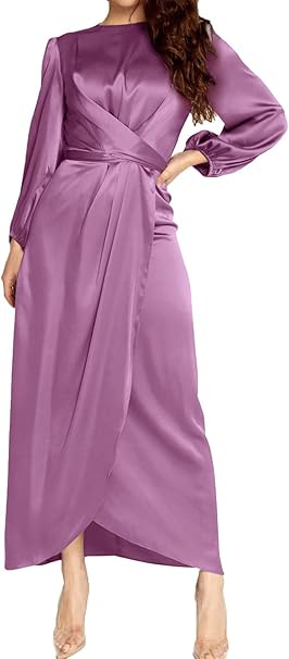 Woman wearing a long-sleeved, purple wrap gown to demonstrate what to wear to a wedding over 50