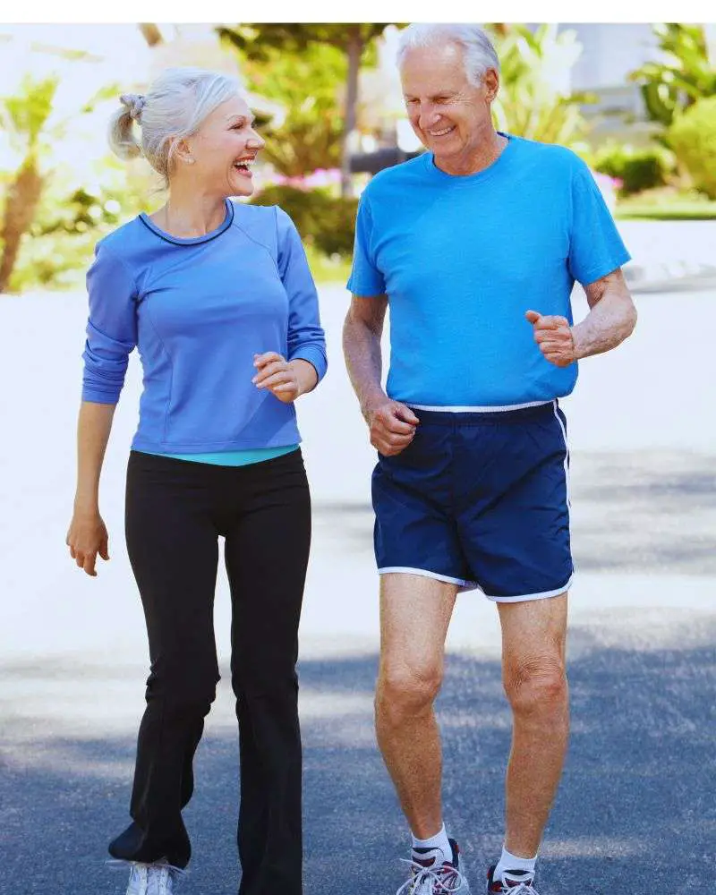 a man and woman running and the woman is wondering how to know if a man over 50 likes you