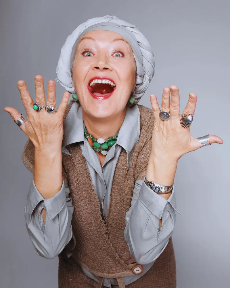 Senior women with an expressive face demonstrating modelling over 50