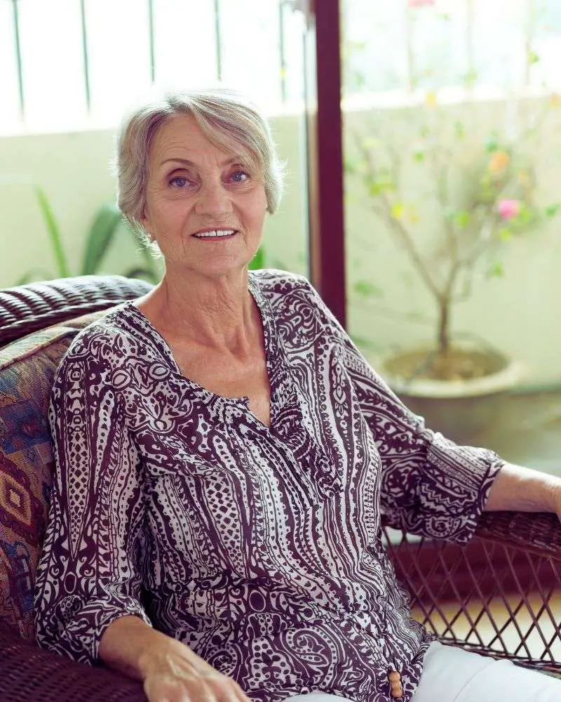 a woman sitting on a chair