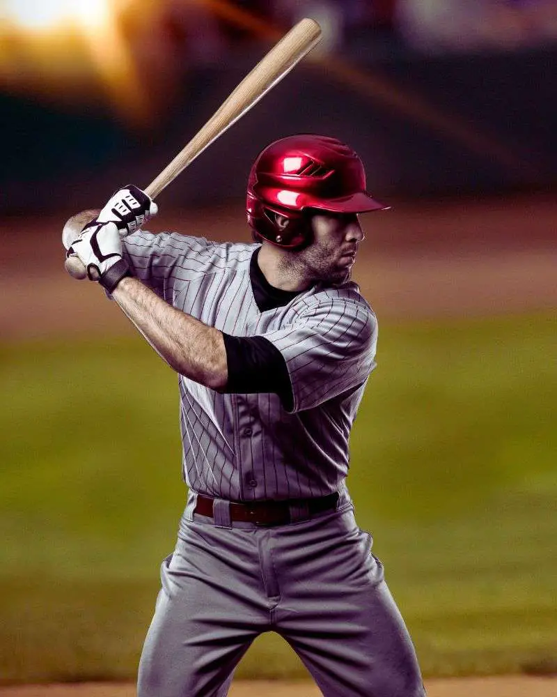 a baseball player holding a bat