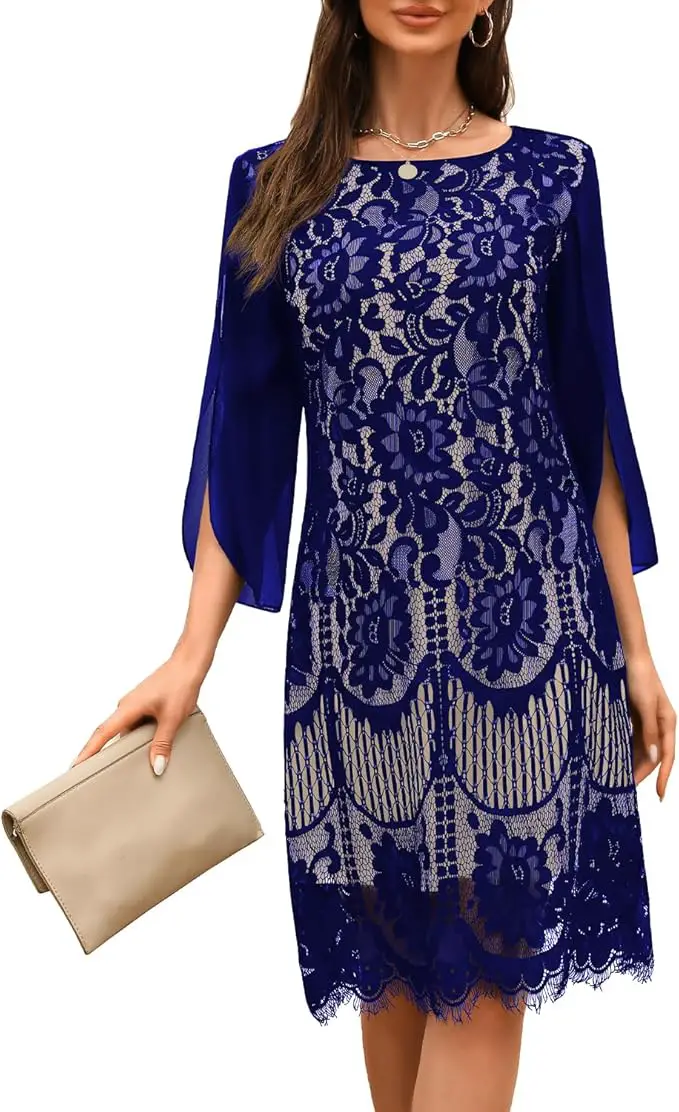 Woman modelling a blue lace cocktail dress