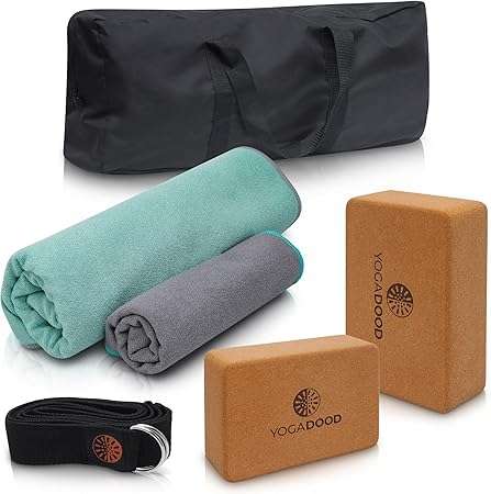 a group of yoga mats and blocks