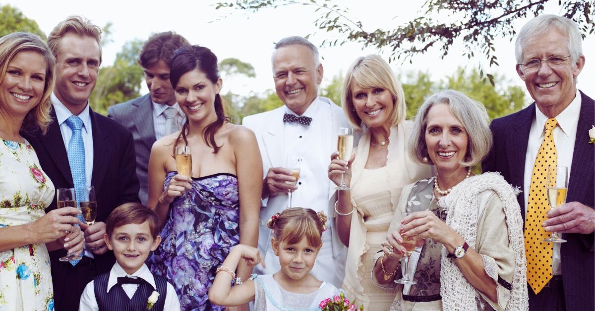 a group of people holding glasses of champagne