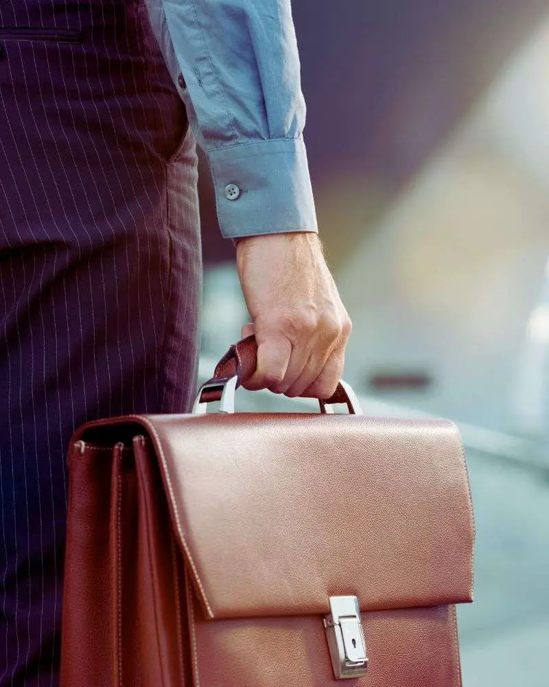 a man holding a briefcase