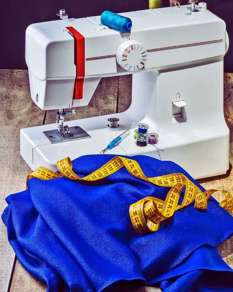 a sewing machine and a blue cloth