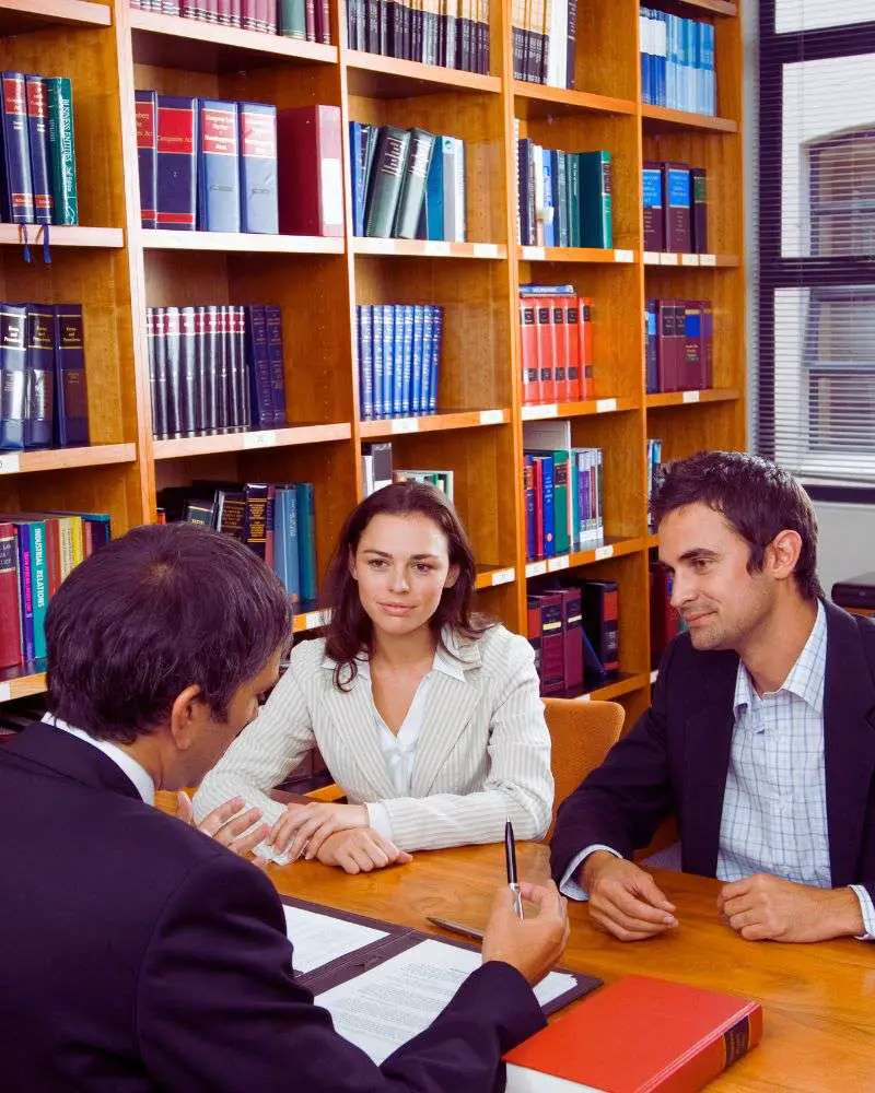 a group of people sitting at a table