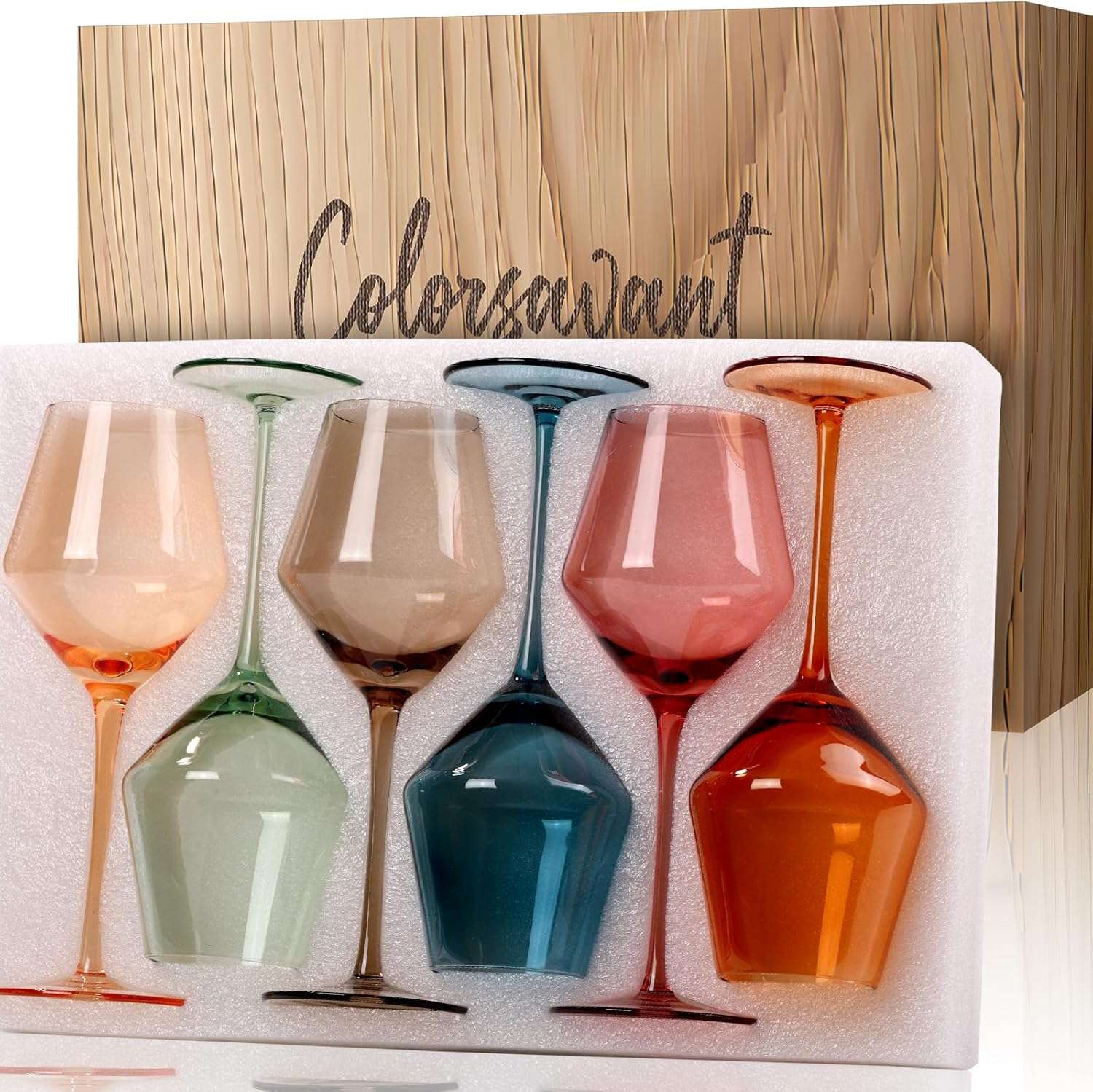 Box of multicolored wine glasses to demonstrate one of many best gifts for women over 50