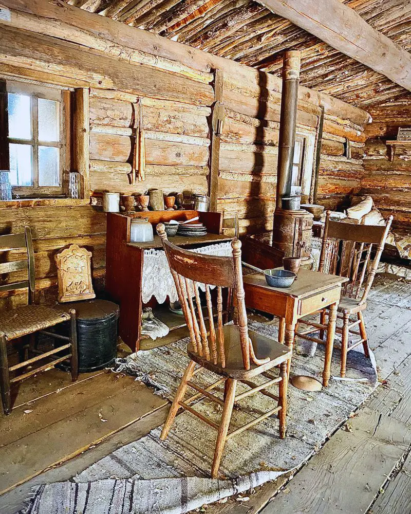 a room with a table and chairs