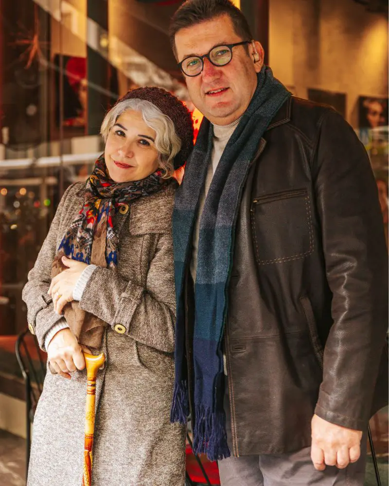 a man and woman standing together who have learned how to overcome nerves on a first date over 50