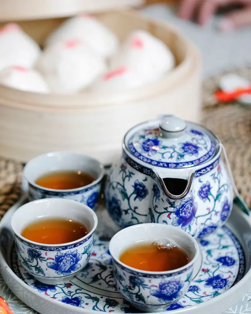 a tea set on a plate demonstrating great Christmas gift ideas for wife over 50