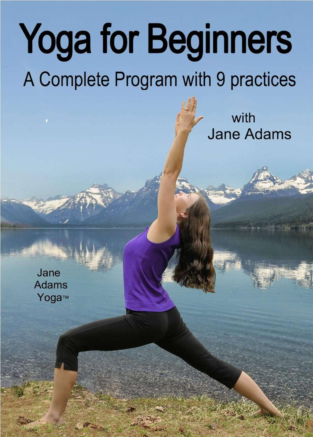 Woman wearing purple and black doing sun salutation