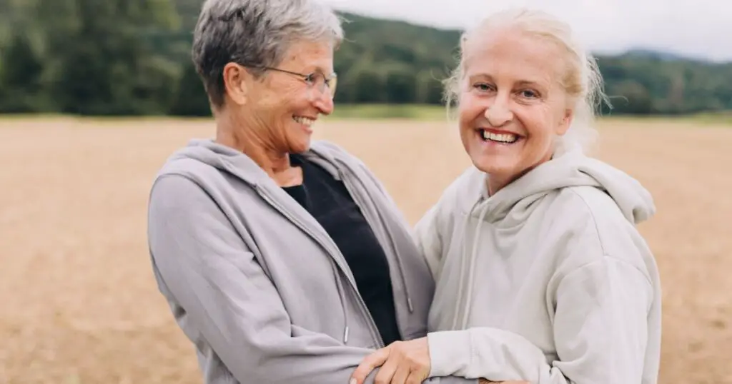 two women smiling at the camera, engaging in life, and proving they are more than just grannies over 60