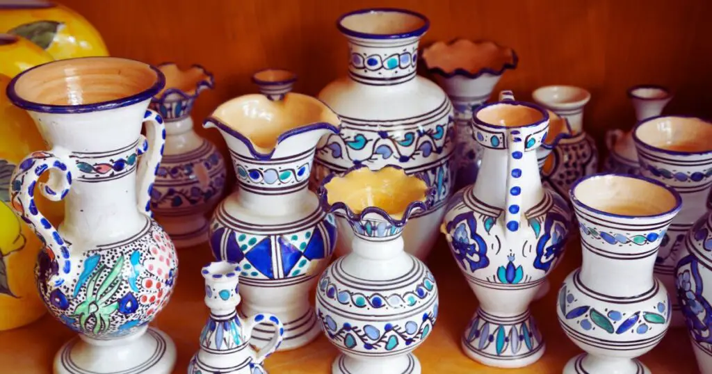 a group of blue and white vases made from pottery that could be interesting to someone who wants to learn how to tell if pottery is valuable