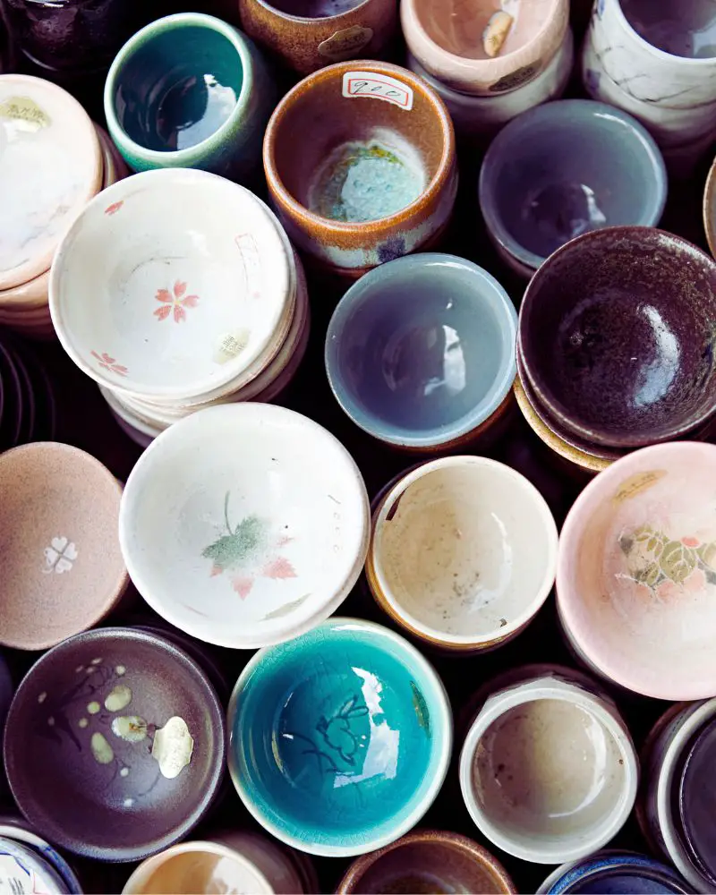 a group of bowls stacked together made of clay using essential pottery studio supplies