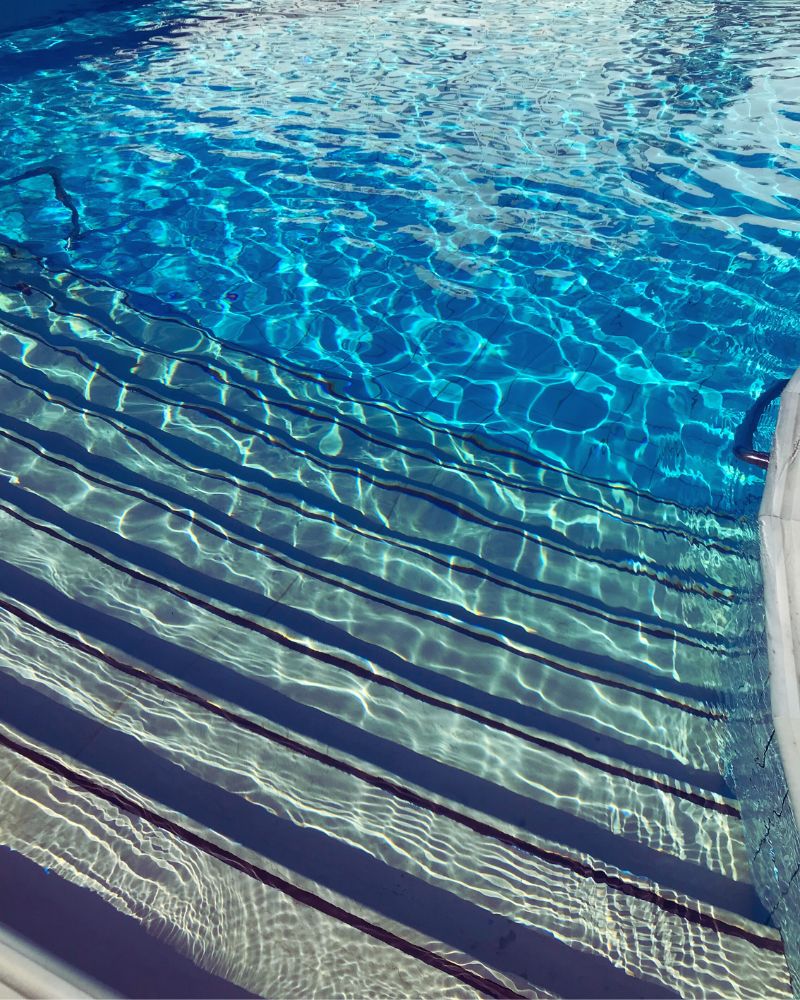 a pool with clear blue water