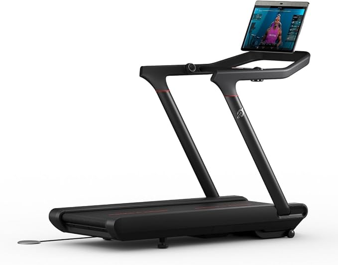 a treadmill with a laptop on it as the best exercise equipment for over 60