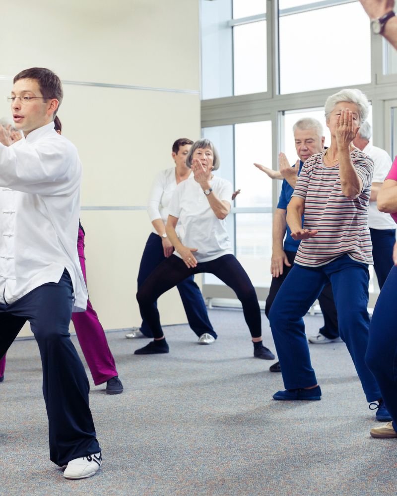 a group of older adults exploring the best martial arts for seniors