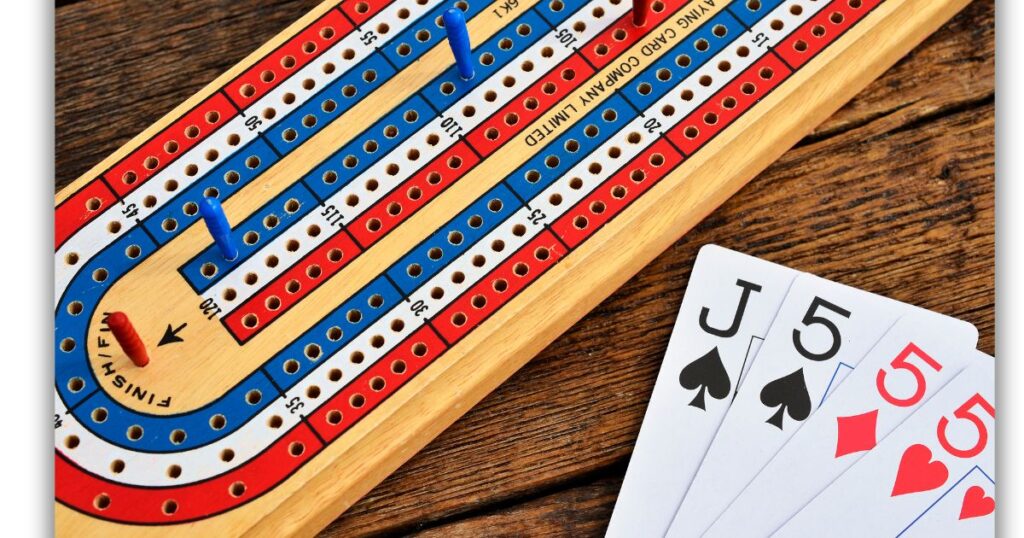 a board with pegs and cards